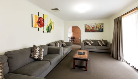 Standard Suite, Multiple Bedrooms, Non Smoking, Kitchen (3 Bedroom S/C Apartment) | Living room | Flat-screen TV