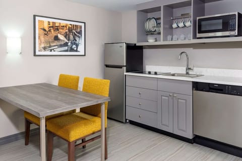 Modern One-Bedroom King Suite w/ Kitchen and Stove | Private kitchen | Mini-fridge, microwave, coffee/tea maker