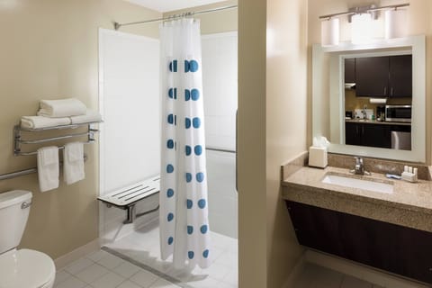 Suite, 1 Bedroom | Bathroom | Combined shower/tub, hair dryer, towels