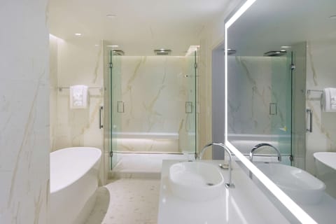 1 King Presidential Suite | Bathroom | Shower, eco-friendly toiletries, hair dryer, towels