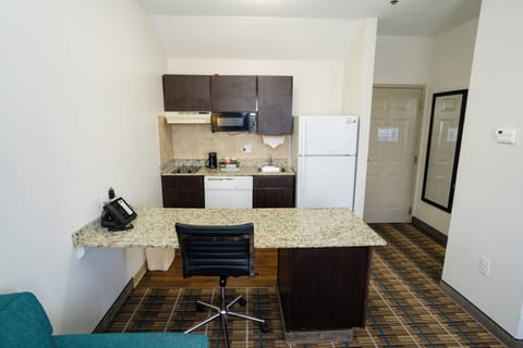 Suite, 1 Queen Bed, Non Smoking | Private kitchen | Full-size fridge, microwave, stovetop, dishwasher