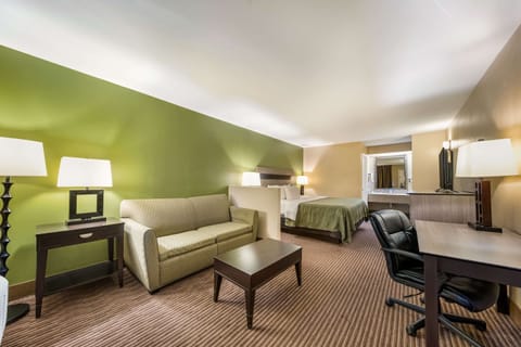 Suite, 1 King Bed, Smoking | Pillowtop beds, desk, laptop workspace, blackout drapes