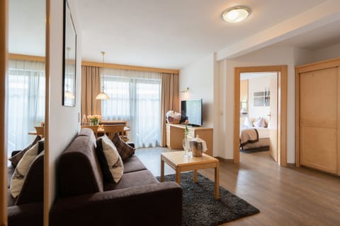 Apartment, 2 Bedrooms, Balcony | Living area | Flat-screen TV