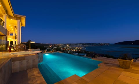 Outdoor pool, pool umbrellas, sun loungers