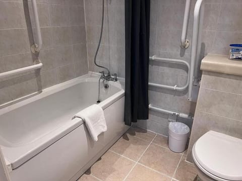 Combined shower/tub, hair dryer, towels, soap