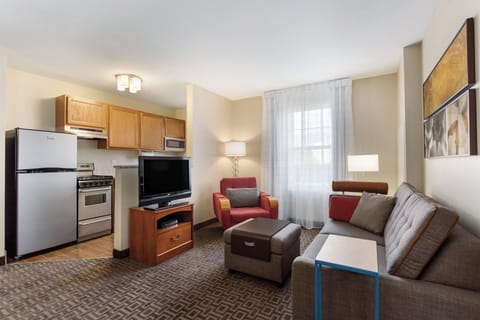 Suite, 2 Bedrooms | Living room | 40-inch flat-screen TV with digital channels, TV, Netflix