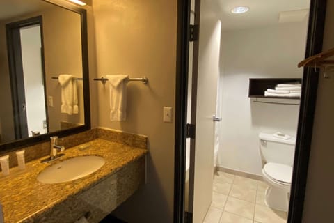 Combined shower/tub, deep soaking tub, free toiletries, hair dryer