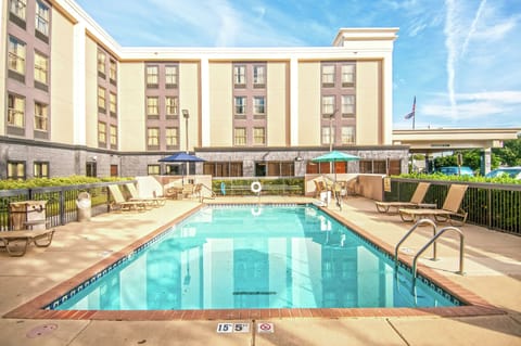 Outdoor pool, pool umbrellas, sun loungers