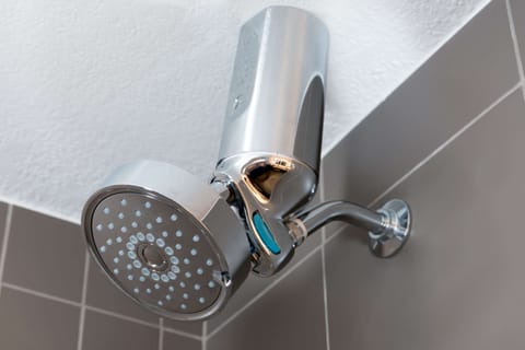 Designer toiletries, hair dryer, towels