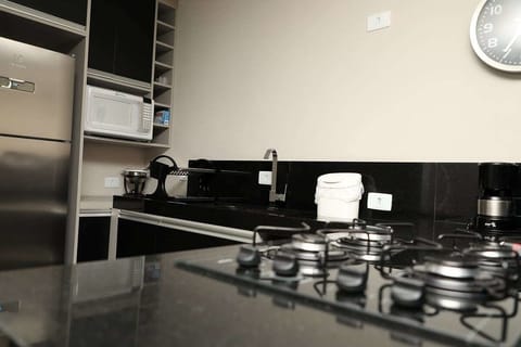 Deluxe Apartment, 2 Bedrooms | Private kitchenette | Full-size fridge, microwave, oven, stovetop