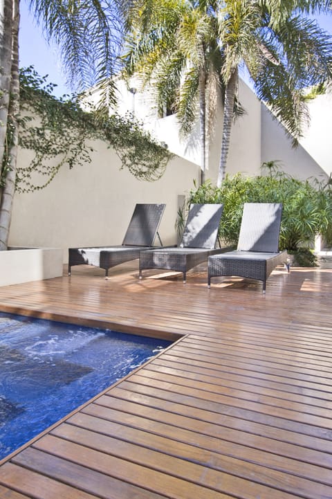 Outdoor pool, pool umbrellas, sun loungers