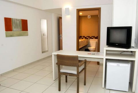 Deluxe Suite, 1 Queen Bed, Non Smoking | Minibar, in-room safe, laptop workspace, iron/ironing board