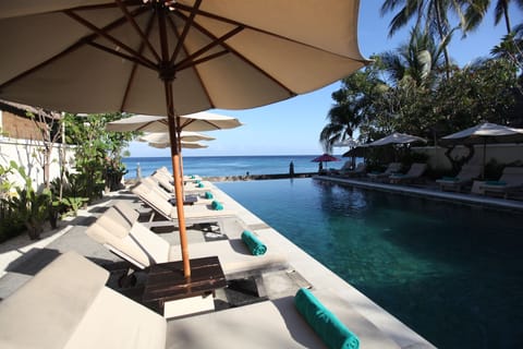 Outdoor pool, pool umbrellas, sun loungers