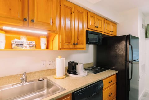 Suite, 1 King Bed | Private kitchen | Fridge, microwave