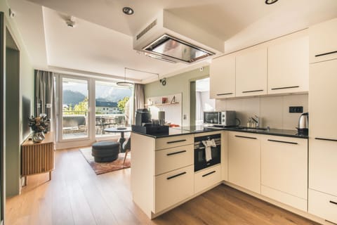 Luxe Apartment 150 | Private kitchen | Full-size fridge, microwave, oven, stovetop