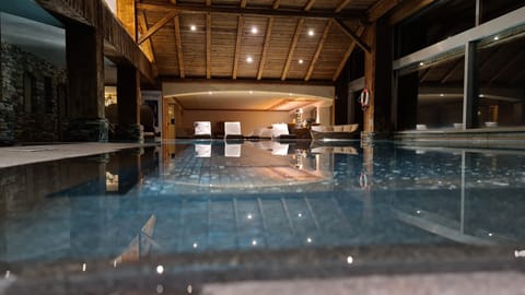 Indoor pool, seasonal outdoor pool, pool umbrellas, sun loungers