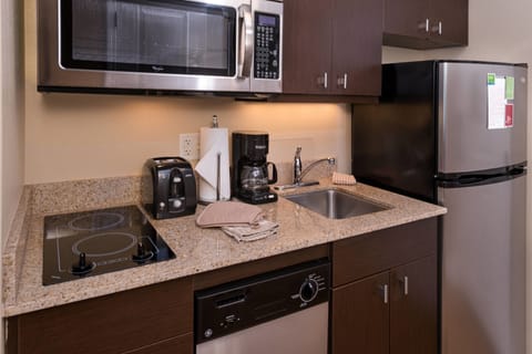 Studio, 1 King Bed | Private kitchen | Fridge, microwave, stovetop, dishwasher