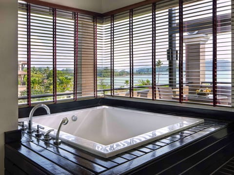 Deluxe Suite, 1 King Bed, Balcony (overlooking Andaman Sea) | Bathroom | Separate tub and shower, deep soaking tub, hydromassage showerhead