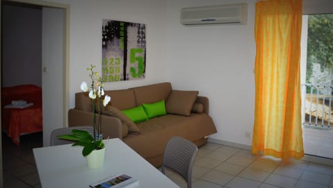 Standard Apartment, 1 Bedroom | Living room | LCD TV, DVD player