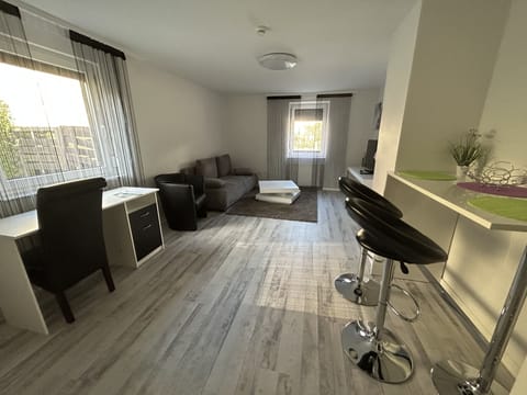 Basic Apartment, 1 Double Bed, Non Smoking | Living area | Flat-screen TV