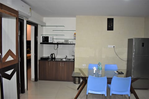 Family Apartment, 2 Bedrooms, 2 Bathrooms | Private kitchen | Fridge, microwave, electric kettle, cookware/dishes/utensils