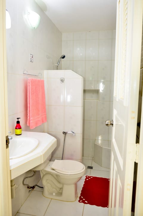 Rainfall showerhead, designer toiletries, hair dryer, heated floors