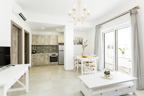 Apartment, 1 Bedroom | Living room | Flat-screen TV