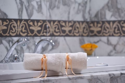 Presidential Suite, Sea View | Bathroom | Bathtub, jetted tub, free toiletries, hair dryer