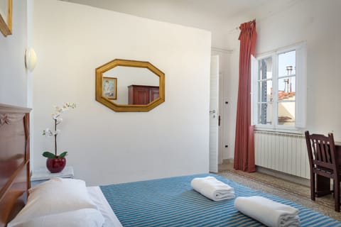 Desk, blackout drapes, soundproofing, iron/ironing board