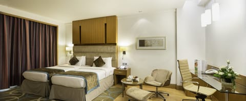 Executive Room | Premium bedding, minibar, in-room safe, desk