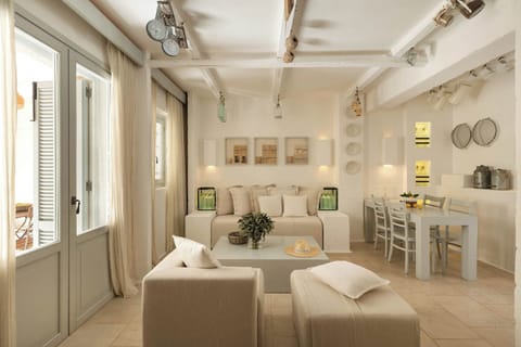 Quadruple Room (Borgo Casetta Magnifica) | Living area | 32-inch LCD TV with satellite channels, TV, iPod dock