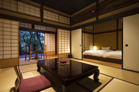 Premium Room with Tatami Area and Open-Air Bath B | Living room | Flat-screen TV