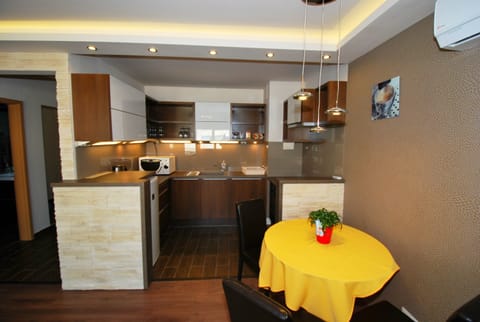 Elite Apartment, Non Smoking, Terrace | Private kitchen | Full-size fridge, microwave, oven, stovetop