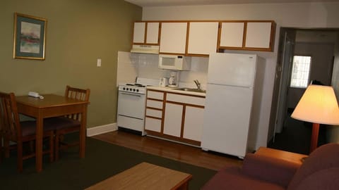 Full-size fridge, microwave, stovetop, coffee/tea maker