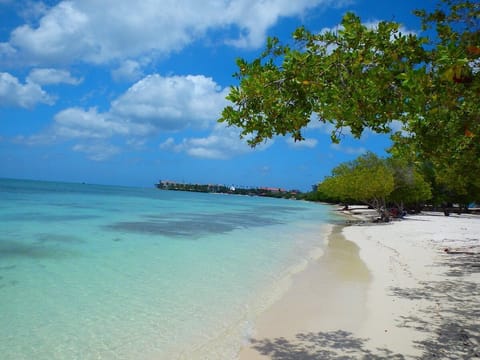 Beach nearby, white sand, 3 beach bars