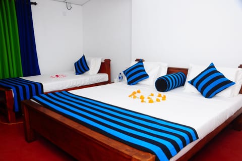 Standard Triple Room, Multiple Beds, Non Smoking | In-room safe, soundproofing, free WiFi, bed sheets