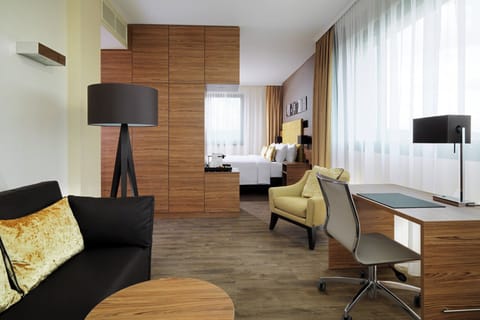 Suite, 1 Bedroom, Corner | In-room safe, desk, blackout drapes, soundproofing