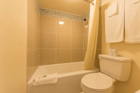 Double Room, 2 Double Beds, Non Smoking | Bathroom | Combined shower/tub, hair dryer, towels