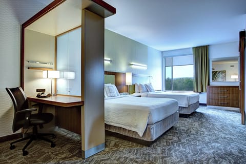 Suite, 2 Queen Beds | In-room safe, desk, iron/ironing board, free cribs/infant beds