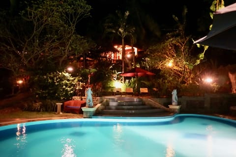 Outdoor pool, pool umbrellas, sun loungers