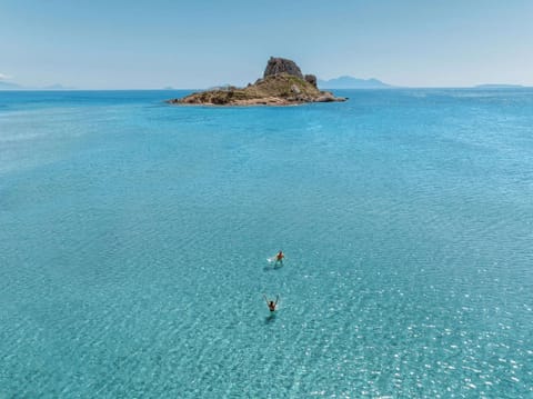 Private beach, white sand, sun loungers, beach umbrellas