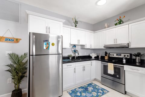 Ground Floor Apartment | Private kitchen | Fridge, microwave, oven, stovetop