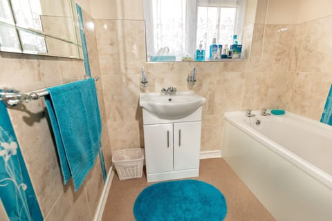 Separate tub and shower, free toiletries, hair dryer, bathrobes