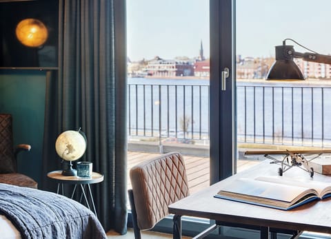 Economy Double Room, Harbor View | Premium bedding, individually decorated, desk, laptop workspace