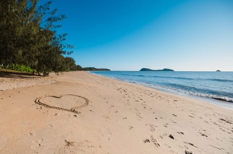 On the beach, sun loungers, beach umbrellas, beach towels