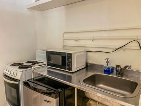 Apartment, 1 Bedroom | Private kitchen | Fridge, microwave, oven, stovetop