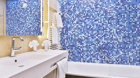 Studio | Bathroom | Deep soaking tub, rainfall showerhead, hair dryer, bathrobes