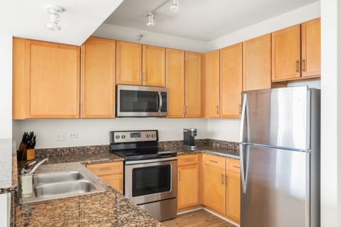 Family Apartment, 3 Bedrooms, Non Smoking, Balcony (Self Check-in with Virtual Front Desk) | Private kitchen | Full-size fridge, microwave, oven, stovetop