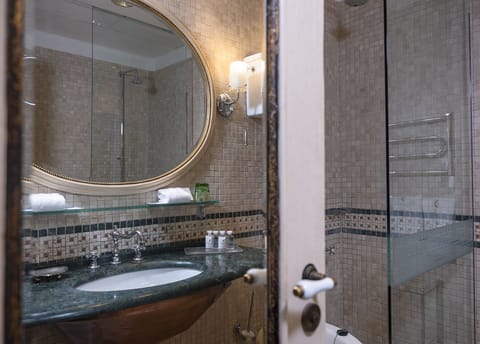 Deluxe Room | Bathroom | Designer toiletries, hair dryer, bathrobes, slippers