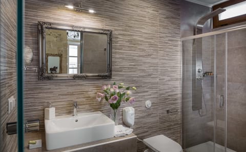 Superior Room | Bathroom | Designer toiletries, hair dryer, towels